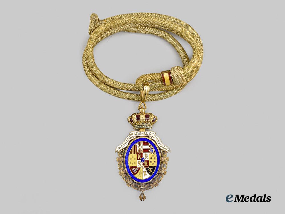 spain,_kingdom._a_decoration_of_the_national_institute_of_social_security,_by_villanueva_u_j_o_y_e_r_o_s___m_n_c3467