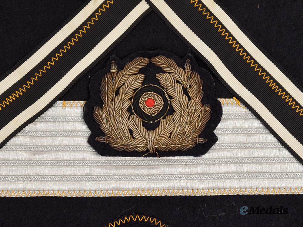 germany,_kriegsmarine._an_allied_souvenir_board_featuring_specialist_insignia_and_medal_ribbons___m_n_c3509