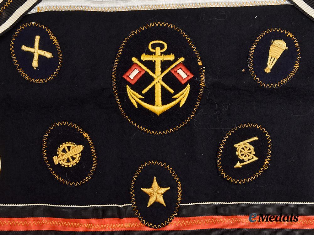germany,_kriegsmarine._an_allied_souvenir_board_featuring_specialist_insignia_and_medal_ribbons___m_n_c3510