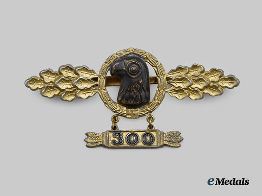germany,_luftwaffe._a_bomber_clasp,_gold_grade_with300_pendant,_by_brüder_schneider___m_n_c3591