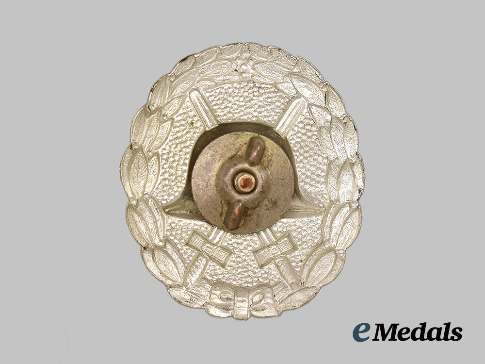 germany,_imperial._a_rare_silver_grade_wound_badge,_screwback_variant,_by_otto_schickle___m_n_c3773