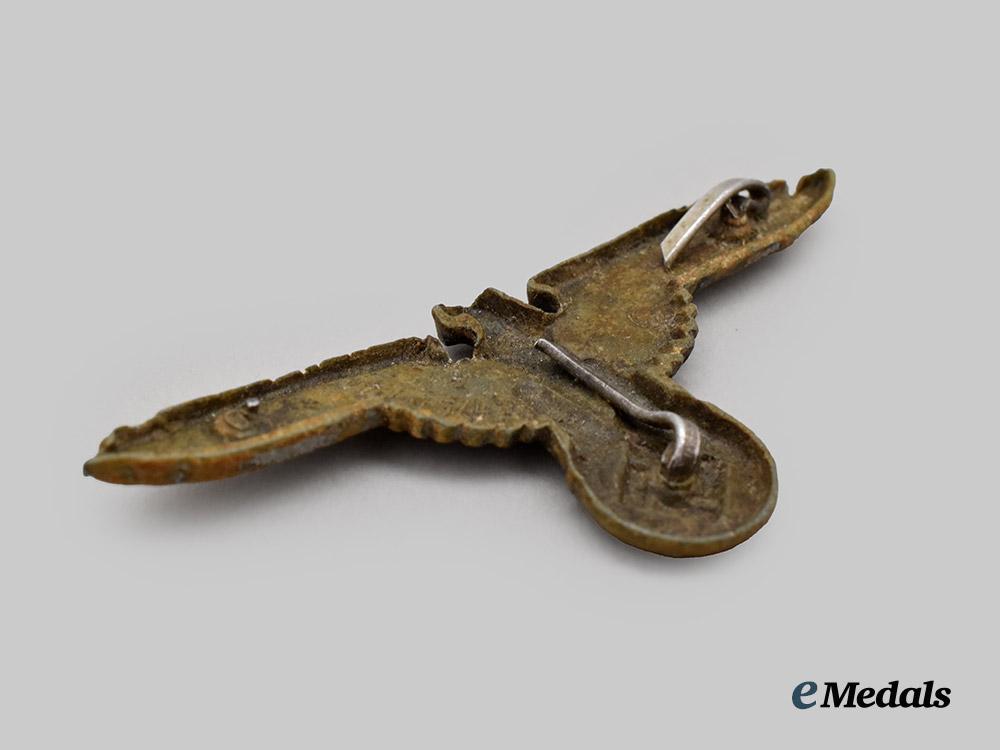 germany,_s_s._a_waffen-_s_s_cap_eagle,_ground-_dug_example,_by_ferdinand_wagner___m_n_c3774