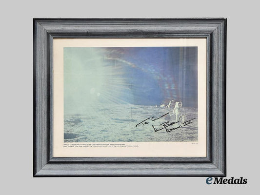 united_states._a_framed_print_of_an_apollo12_astronaut_on_the_moon_signed_by_lunar_module_pilot_alan_bean___m_n_c3837