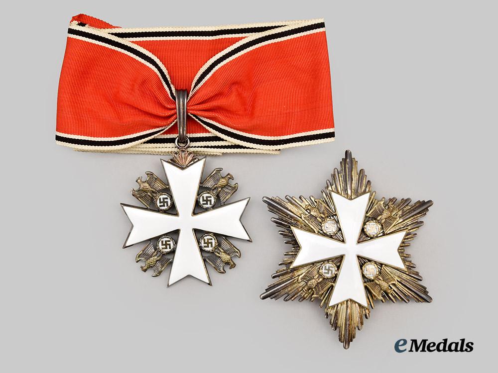germany,_third_reich._a_rare_order_of_the_german_eagle,_merit_cross_with_breast_star_and_case,_by_gebrüder_godet___m_n_c3989