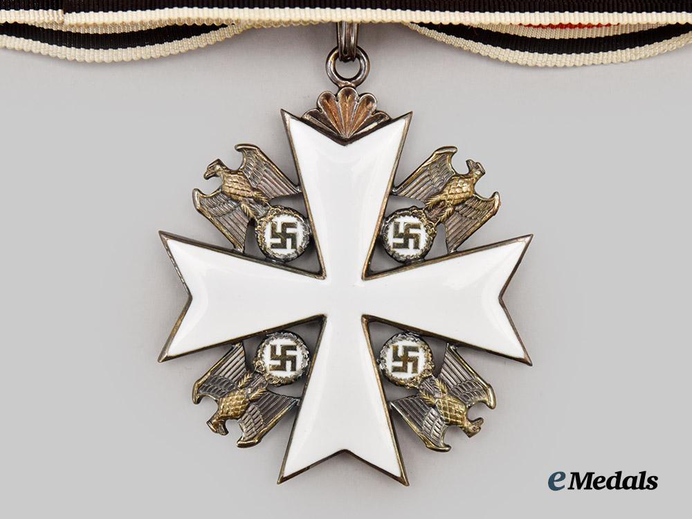 germany,_third_reich._a_rare_order_of_the_german_eagle,_merit_cross_with_breast_star_and_case,_by_gebrüder_godet___m_n_c3993