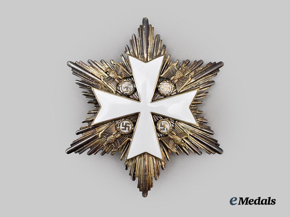 germany,_third_reich._a_rare_order_of_the_german_eagle,_merit_cross_with_breast_star_and_case,_by_gebrüder_godet___m_n_c3994