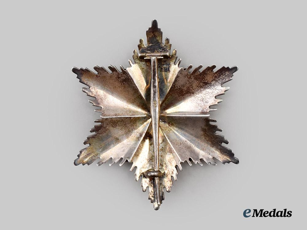 germany,_third_reich._a_rare_order_of_the_german_eagle,_merit_cross_with_breast_star_and_case,_by_gebrüder_godet___m_n_c3996