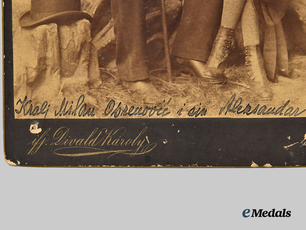 serbia,_kingdom._a_photograph_of_king_milan_i_of_serbia_with_his_son_and_future_king_alexander_i,_c.1888___m_n_c4445