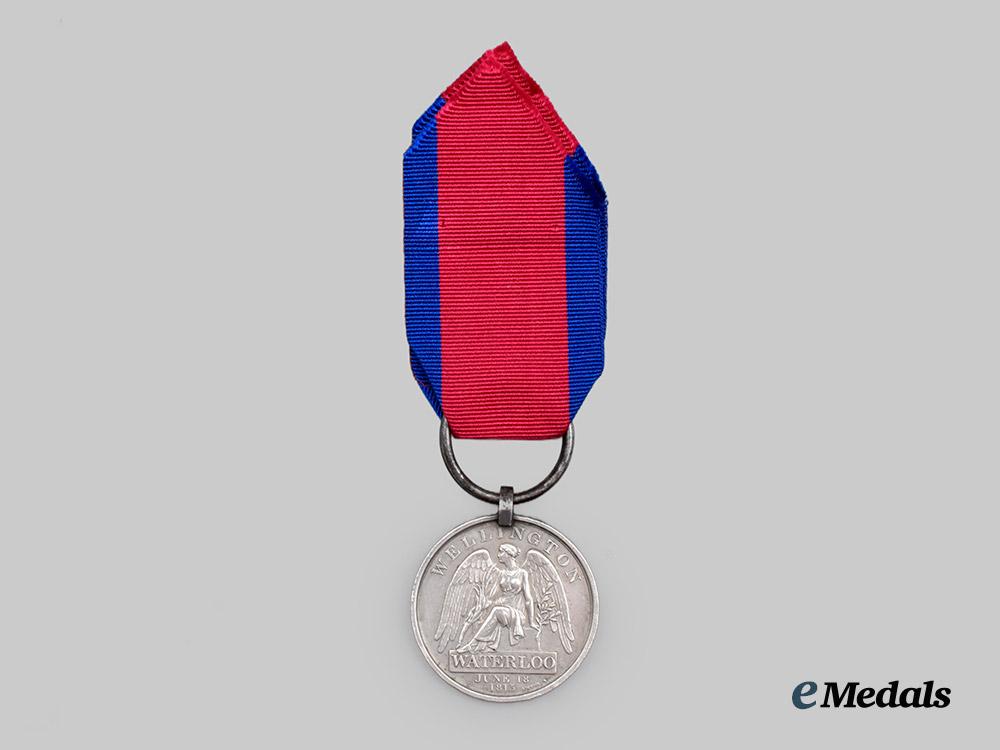 united_kingdom._an1815_battle_of_waterloo_medal_to_hen._baumgarte_of_the_king’s_german_legion_artillery_regt.___m_n_c5359