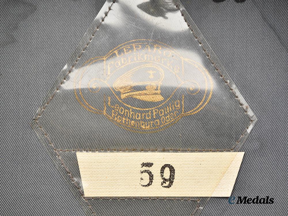germany,_third_reich._a_bahnschutz_officer’s_visor_cap,_by_leonhard_paulig___m_n_c5550