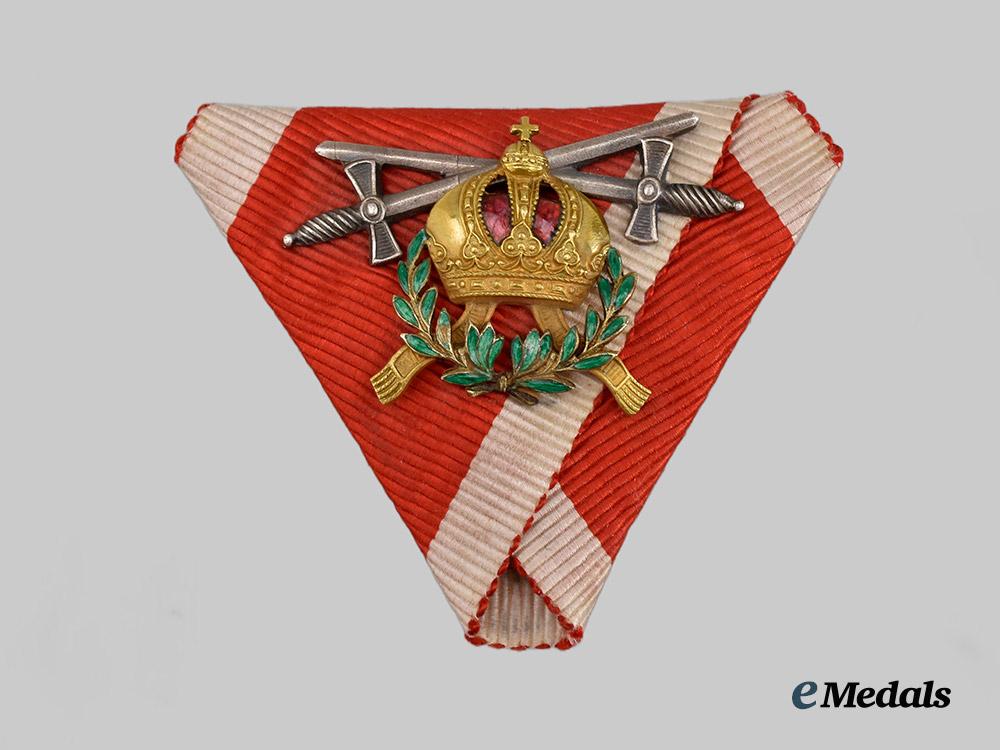 austria,_empire._an_order_of_leopold_ribbon_with_insignia_for_a_commander_w._war_decoration_a._swords_in_silver___m_n_c6261