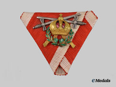 Austria, Empire. An Order of Leopold Ribbon with Insignia for a Commander w. War Decoration a. Swords in Silver