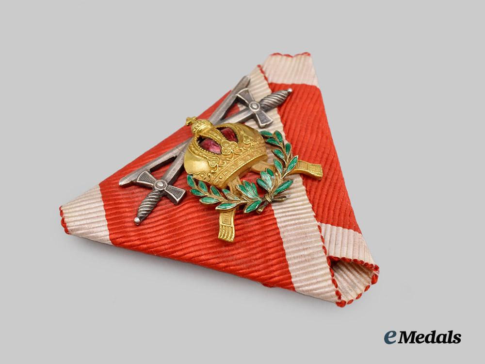 austria,_empire._an_order_of_leopold_ribbon_with_insignia_for_a_commander_w._war_decoration_a._swords_in_silver___m_n_c6262