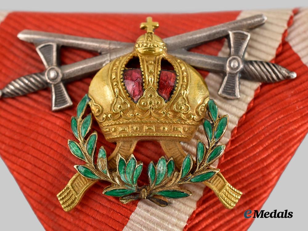 austria,_empire._an_order_of_leopold_ribbon_with_insignia_for_a_commander_w._war_decoration_a._swords_in_silver___m_n_c6264