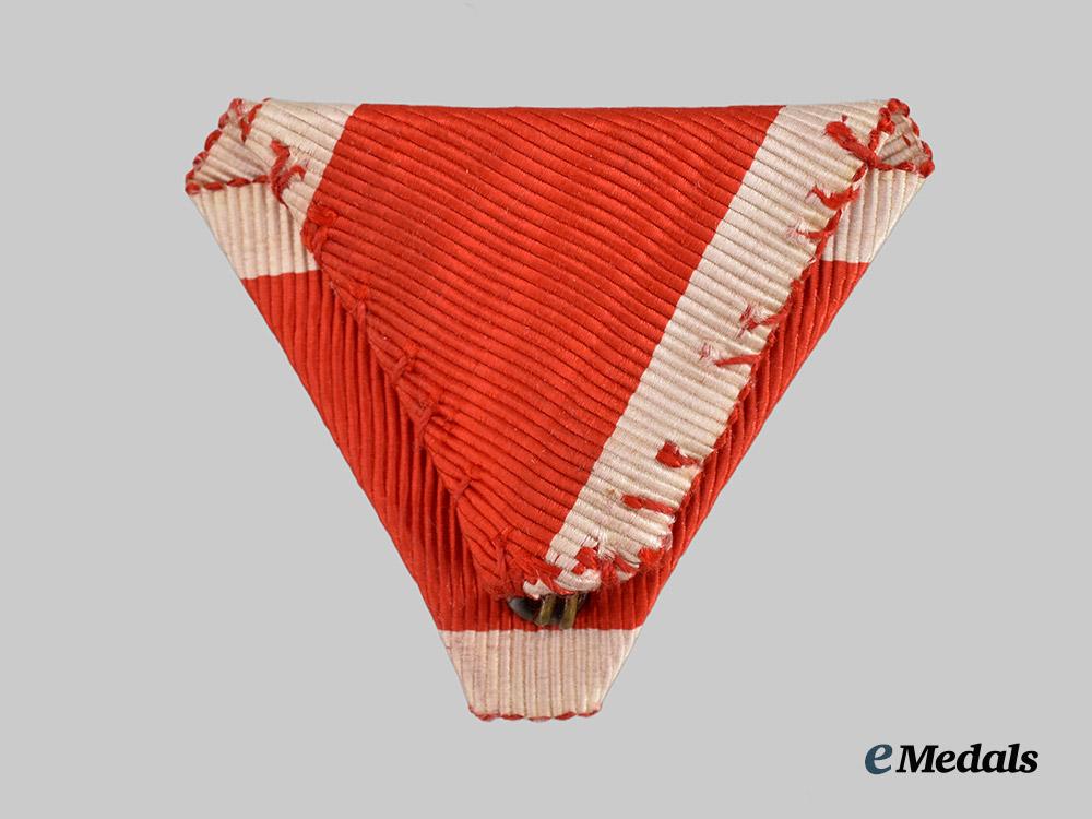 austria,_empire._an_order_of_leopold_ribbon_with_insignia_for_a_commander_w._war_decoration_a._swords_in_silver___m_n_c6265