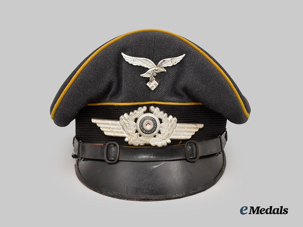 germany,_luftwaffe._a_flight_personnel/_fallschirmjäger_e_m/_n_c_o’s_visor_cap,_late-_war_example,_by_marie_slama&_sohn___m_n_c6268