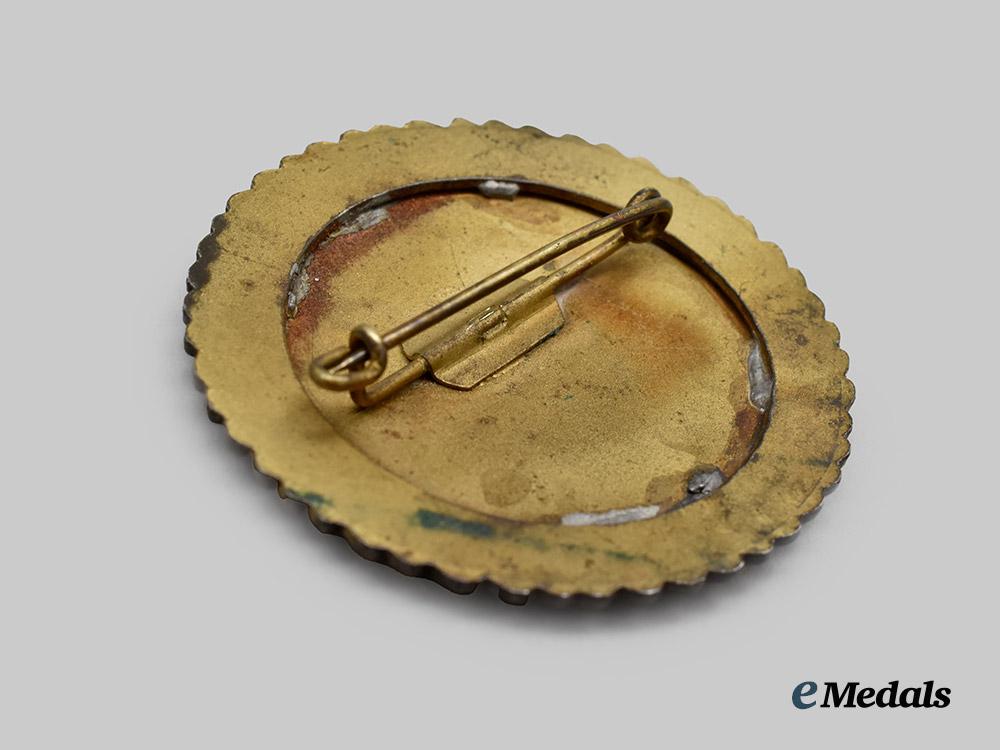 germany,_third_reich._a1943_tyrolean_marksmanship_gau_achievement_badge_for_pistol_shooting___m_n_c6343