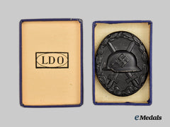 Germany, Wehrmacht. A Black Grade Wound Badge, with Case