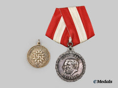 Denmark, Kingdom. A Pair of Carlsberg Brewery Faithful Service Medals