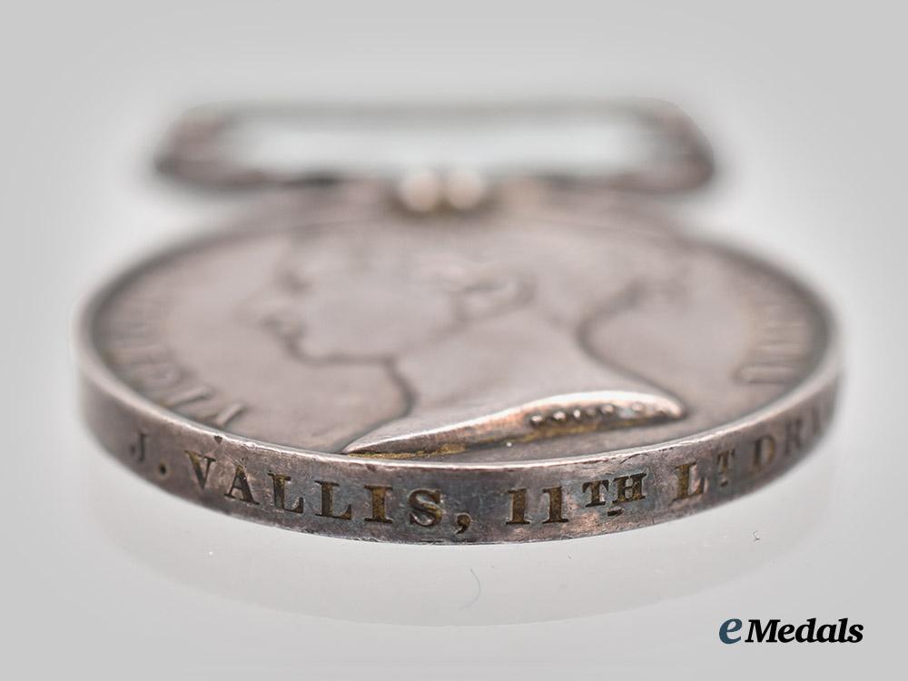 united_kingdom._an_army_of_india_medal_to_j._vallis,11th_light_dragoons___m_n_c7198