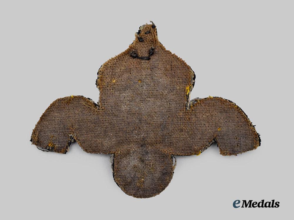 germany,_imperial._an_imperial_navy_deck_officer’s_visor_cap_insignia___m_n_c7480