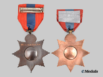 united_kingdom._a_pair_of_imperial_service_medals,_in_case.___m_n_c7627
