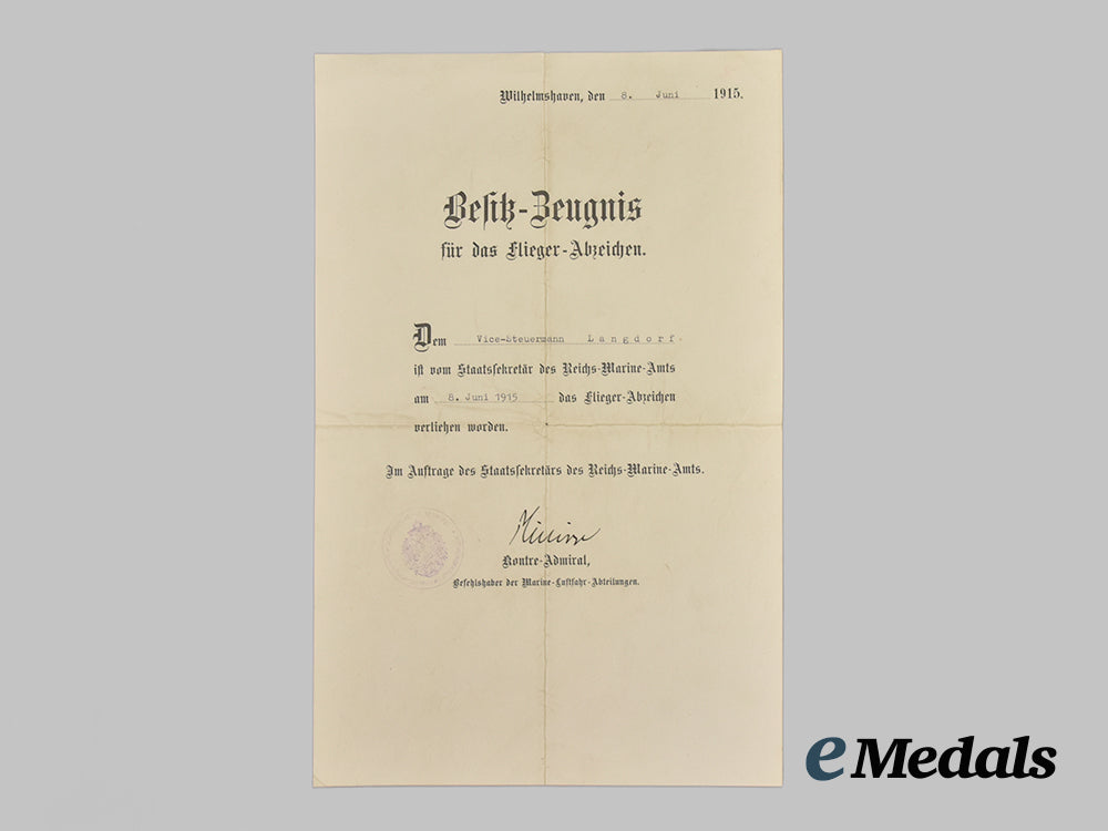 germany,_imperial._a_rare_naval_sea_pilot’s_award_document_set_to_vice-_steuermann_langdorf,_with_recipient_photo___m_n_c7835