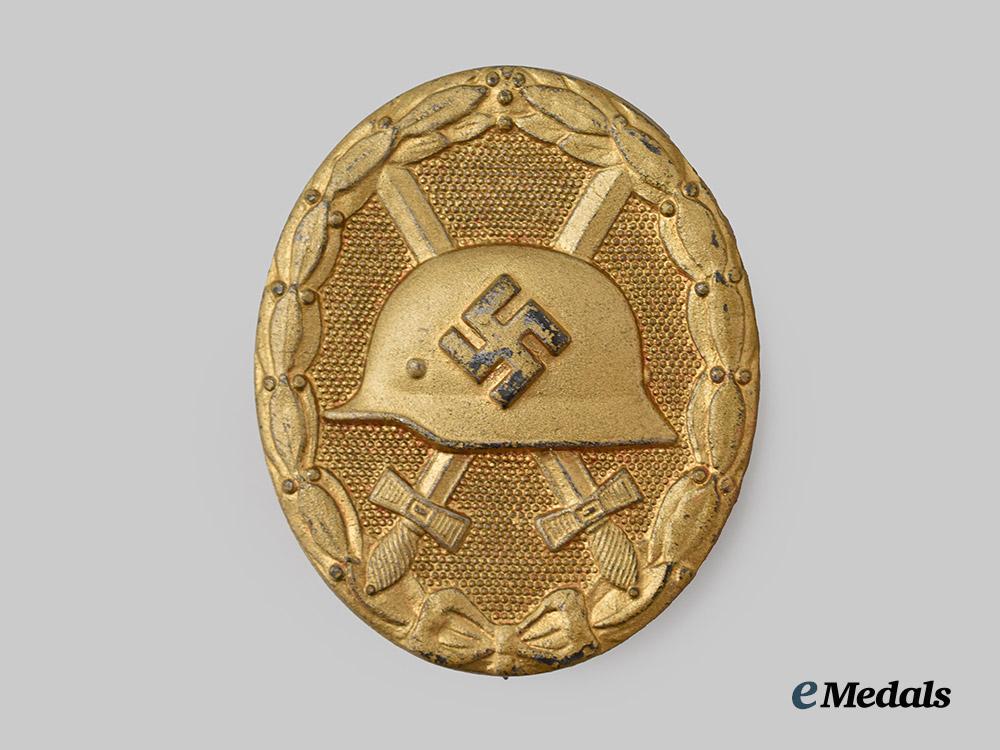 germany,_wehrmacht._a_gold_grade_wound_badge,_with_period_case,_by_the_vienna_mint___m_n_c8174