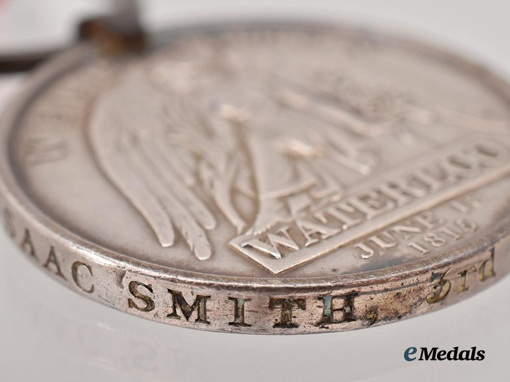united_kingdom._a_waterloo_medal_to_serjeant_isaac_smith,3rd_battalion,14th_regiment_of_foot___m_n_c8221-b