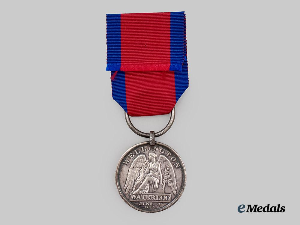 united_kingdom._a_waterloo_medal_to_private_thomas_woods,2nd_battalion,30th_regiment_of_foot___m_n_c8343