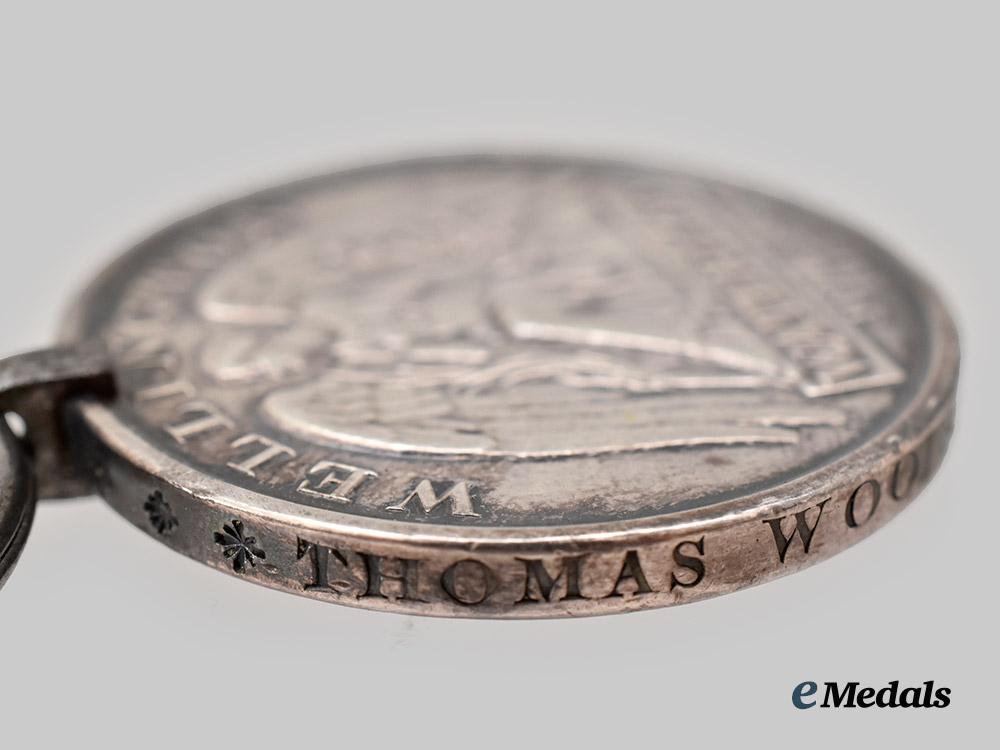 united_kingdom._a_waterloo_medal_to_private_thomas_woods,2nd_battalion,30th_regiment_of_foot___m_n_c8345