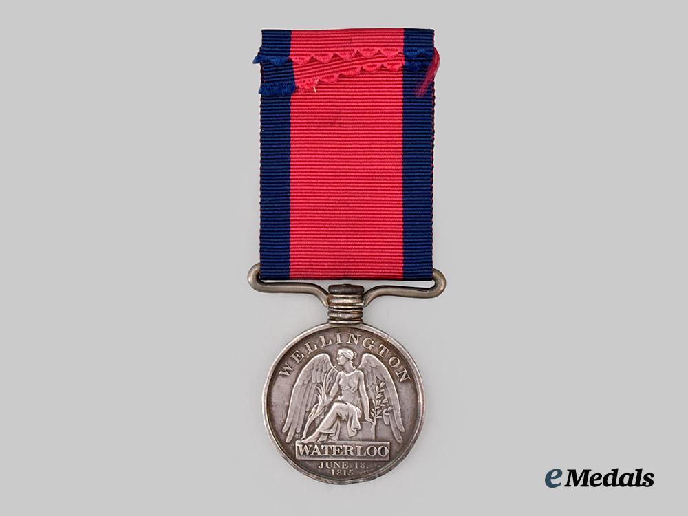 united_kingdom._a_waterloo_medal_to_private_james_vallis,11th_regiment,_light_dragoons___m_n_c8367