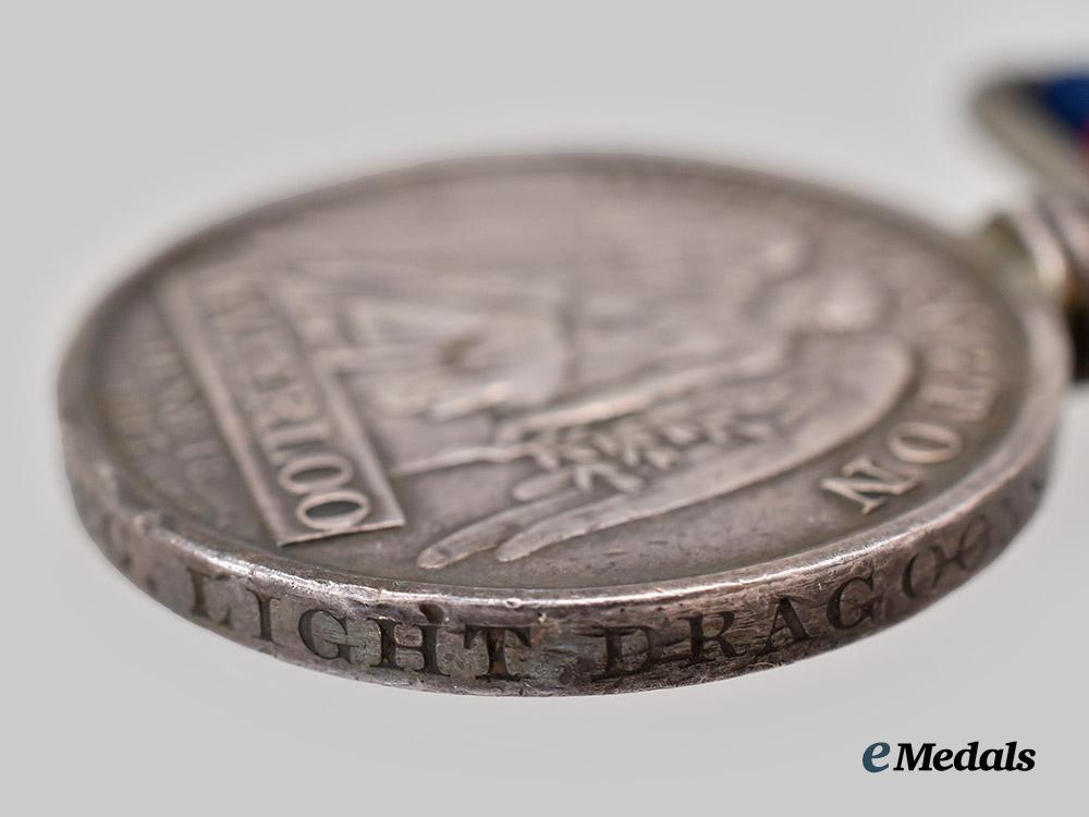 united_kingdom._a_waterloo_medal_to_private_james_vallis,11th_regiment,_light_dragoons___m_n_c8371