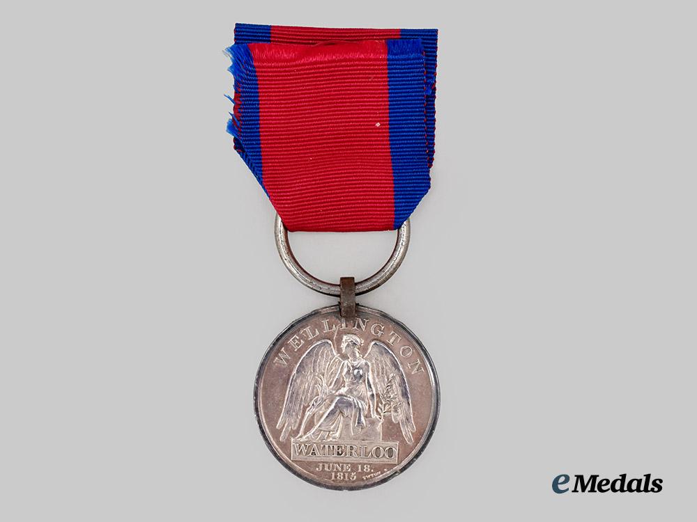 united_kingdom._a_waterloo_medal_to_private_peter_wardrop,1st_battalion,79th_regiment,_severely_wounded_at_waterloo___m_n_c8376