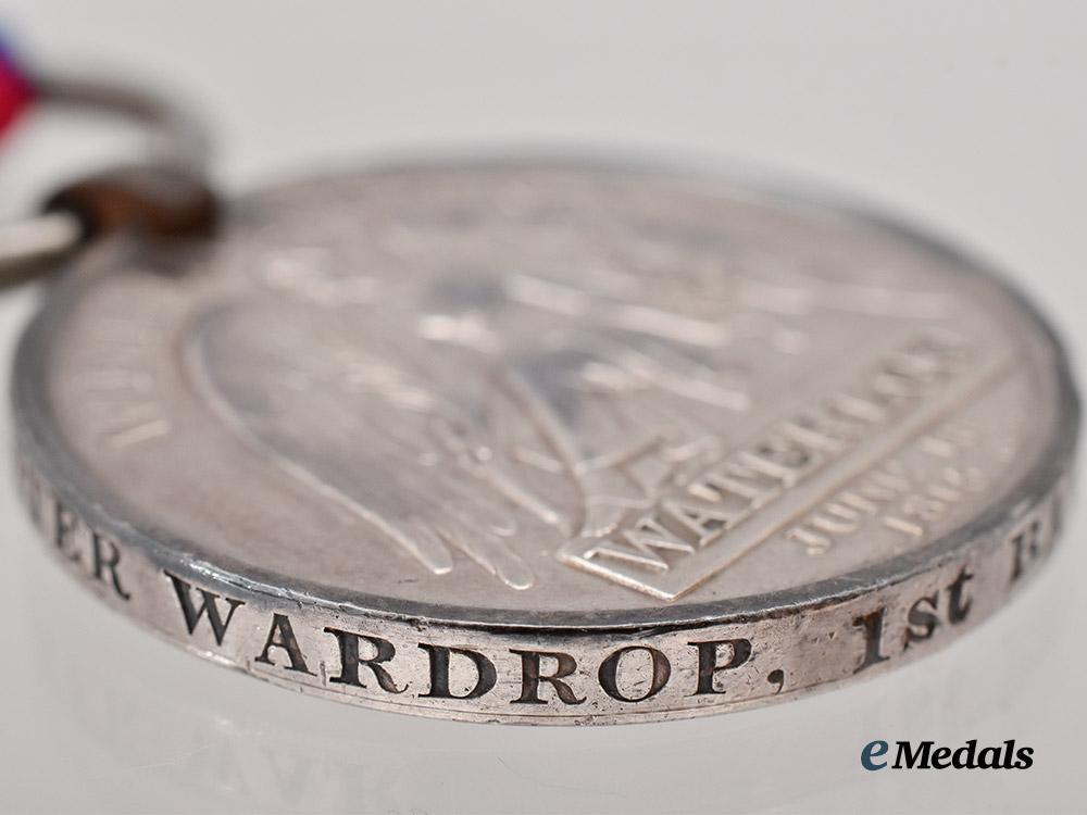 united_kingdom._a_waterloo_medal_to_private_peter_wardrop,1st_battalion,79th_regiment,_severely_wounded_at_waterloo___m_n_c8379