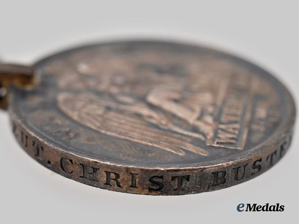 united_kingdom._a_waterloo_medal_to_lieutenant_christopher_busteed,2nd_battalion,69th_regiment_of_foot,_wounded_at_waterloo___m_n_c8404