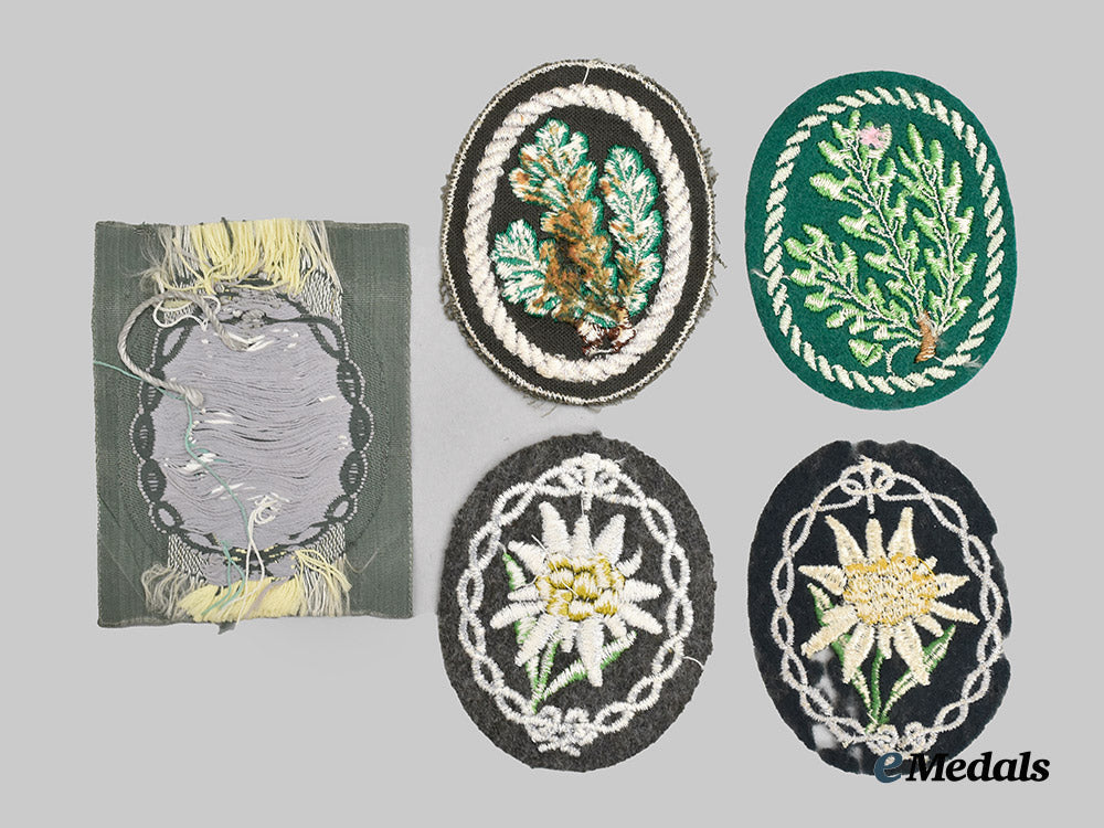 germany,_heer._a_mixed_lot_of_jäger_and_gebirgsjäger_sleeve_insignia___m_n_c8457