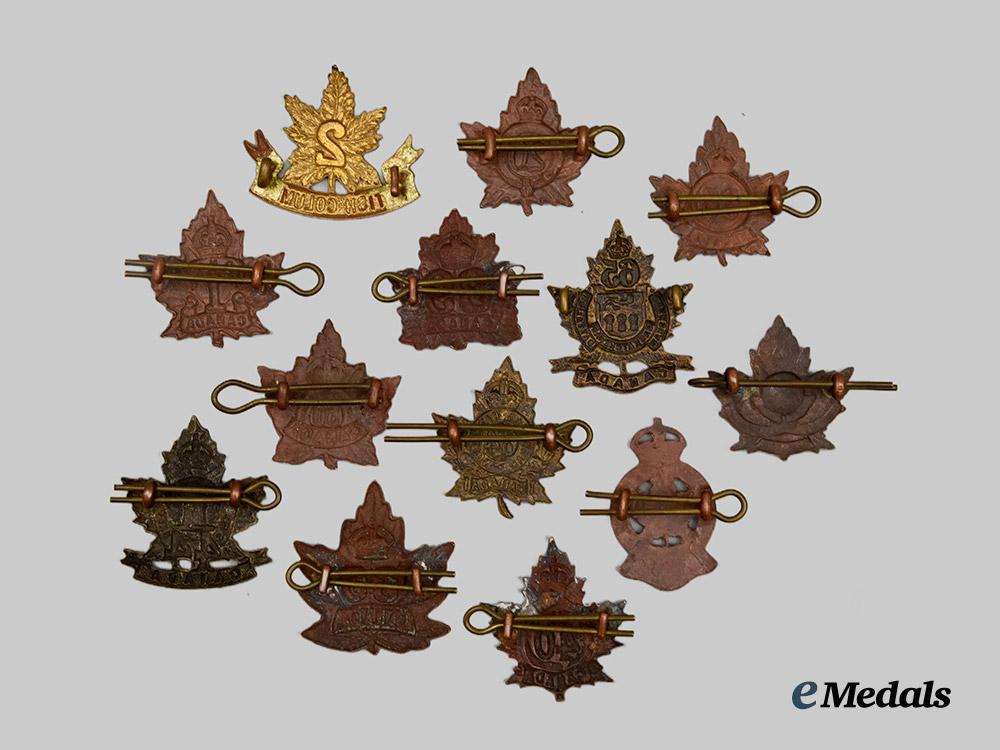 canada,_c_e_f._thirteen_first_war_collar_badges___m_n_c8654