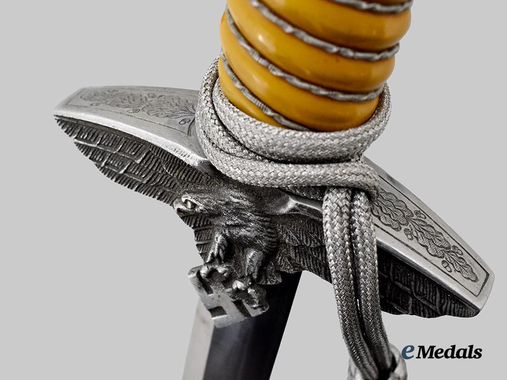 germany,_luftwaffe._an_officer’s_dress_dagger,_with_hanger,_by_carl_eickhorn___m_n_c8786