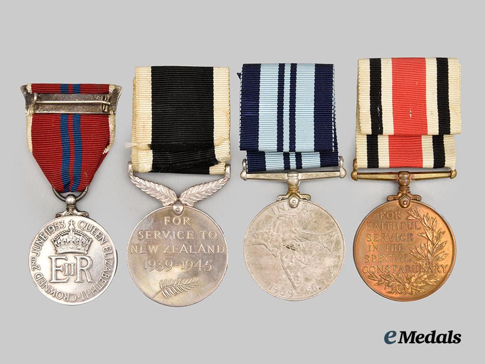 united_kingdom._a_lot_of_four_medals_and_awards(_india_service/_special_constabulary/_elizabeth_i_i_coronation/_new_zealand_service)___m_n_c8867