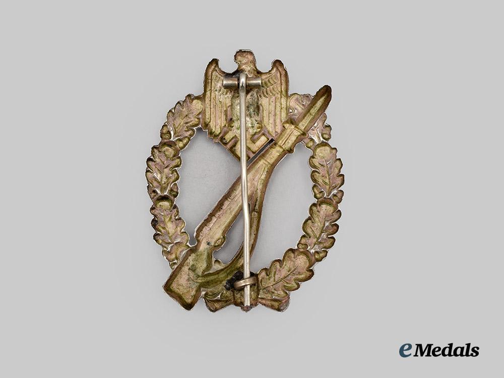germany,_wehrmacht._an_infantry_assault_badge,_silver_grade,_by_c._e._juncker___m_n_c9098