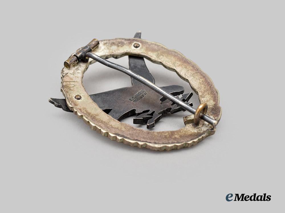 germany,_luftwaffe._a_radio_operator_and_air_gunner_badge,_early_and_named_example,_by_c._e._juncker___m_n_c9113