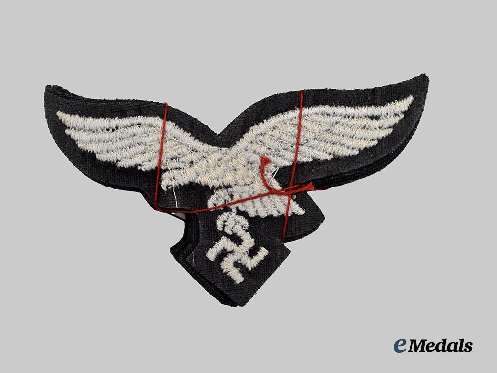germany,_luftwaffe._a_lot_of_mint_and_unissued1st_fallschirm-_panzer_division_hermann_göring_uniform_eagles___m_n_c9491