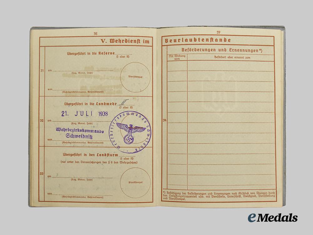 germany,_heer._a_wehrpaß_to_paul_maiwald,_construction_and_security_units_with_western_and_eastern_front_combat___m_n_c9720