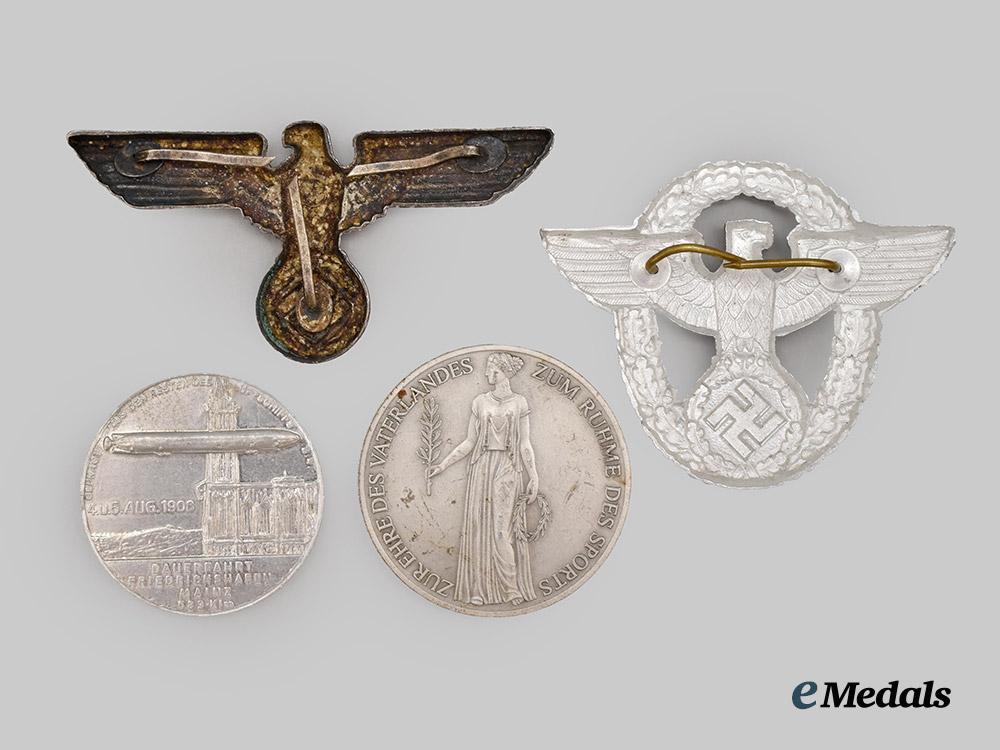 germany,_third_reich._a_mixed_lot_of_cap_insignia_and_medallions___m_n_c9947