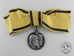 A 1911 Württemberg Anniversary Medal; Ladies Version