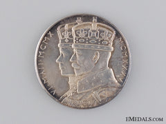 A 1910-1935 King George V And Queen Mary Silver Jubilee Commemorative Medal