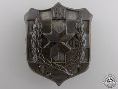 A 1943 Iron Trefoil Officers School Commemorative Badge