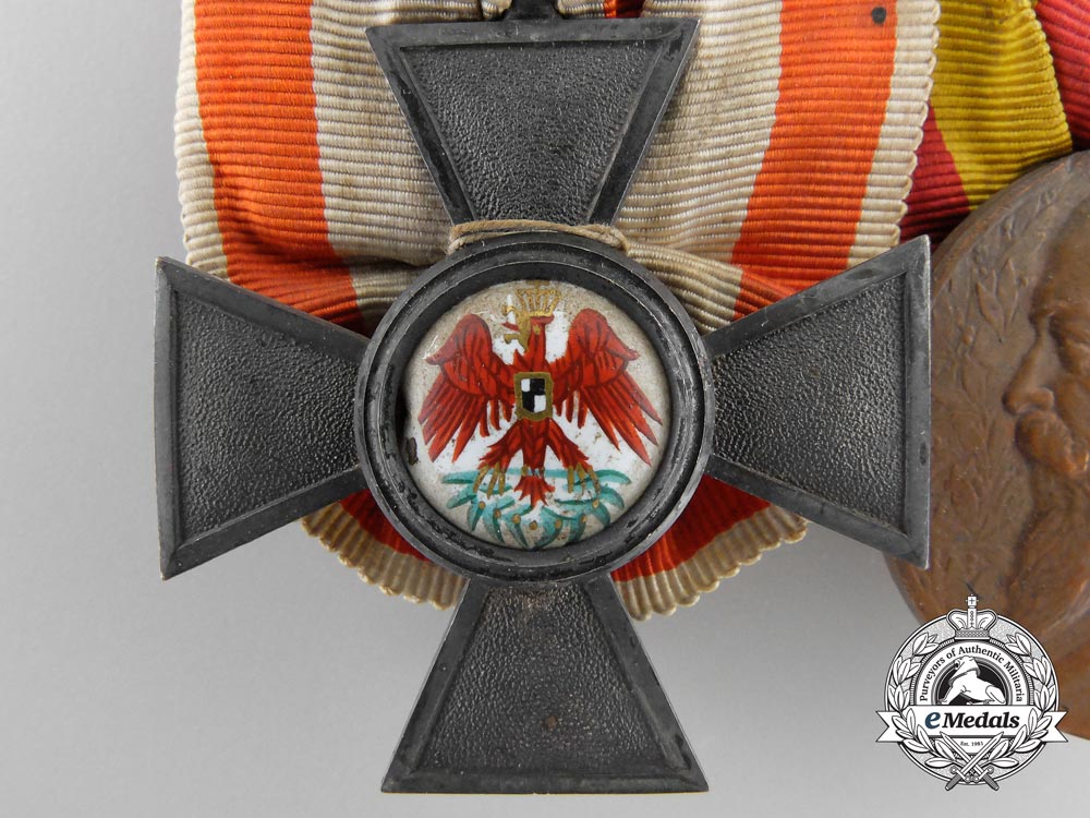 a_german_imperial_red_eagle_medal_bar_by_neuhaus&_son,_berlin_a_2231