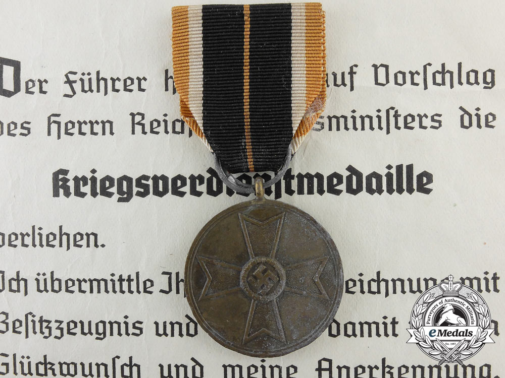 a_war_merit_medal_with_award_document1943_a_2630_1